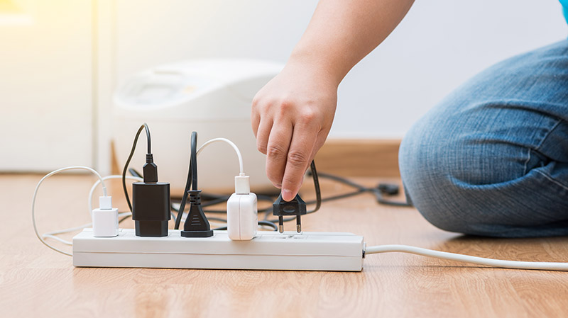 Someone unplugging cords