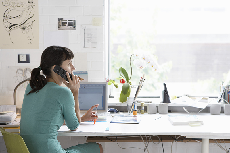 Image of woman working from home