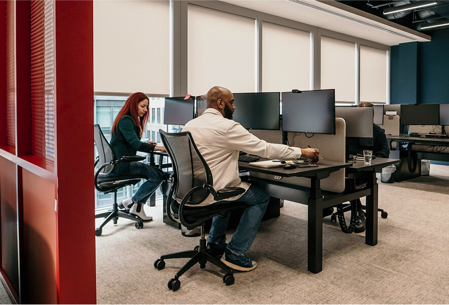 people sitting at their desks after receiving consultation