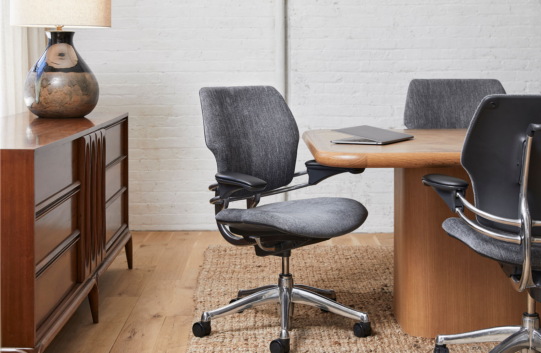 Freedom Headrest in Kvadrat Vanir textile with Graphite Frame