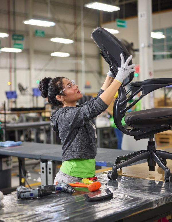woman working on Re-freshed Freedom Task chair